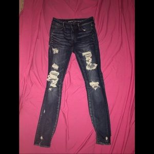 Dark wash ripped AE jeans